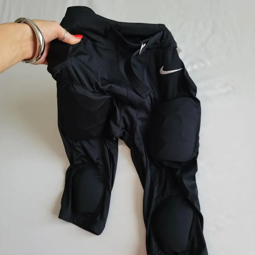 NWT NIKE RECRUIT KID'S padded football pants, size kid's large
